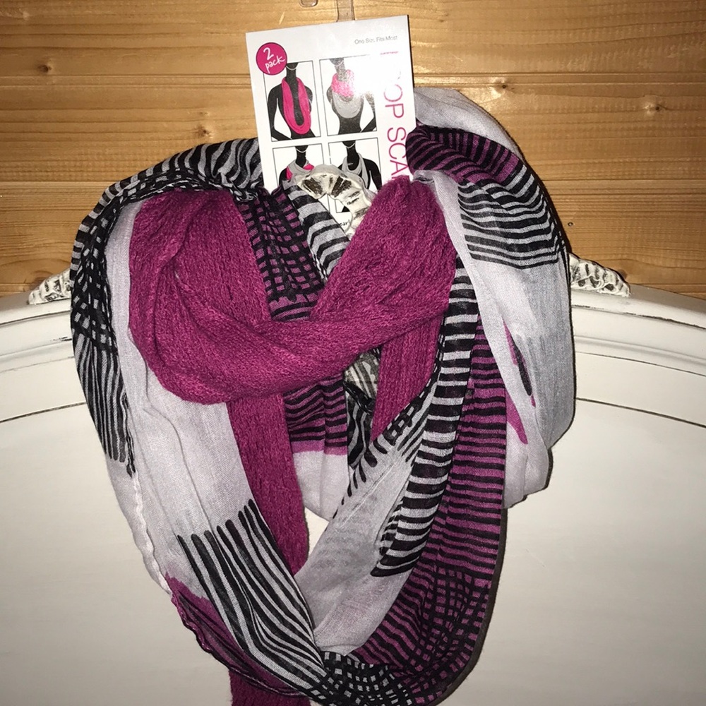 Two loop scarves that can be worn together.